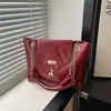 Bolsa Pequeña Cuadrada de Mano con Textura de Gama Alta al por Mayor para Mujer 2025 Otoño Nueva Moda Bolso de Hombro de Lujo Ligero Bolso de Cadena para la Axila