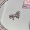 Pinza para el pelo de corazón de circón con lazo, linda, versátil, estilo francés coreano para mujer, accesorio pequeño para el lateral del cabello, exquisito y de alta gama
