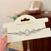Pulseira Flor de Trevo de Quatro Folhas com Microincrustação de Zircônia, Design de Nicho Ins Estilo Coreano, Joia de Moda Personalizada de Luxo Leve de Alta Qualidade para Mulheres