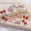 Celebridad de Internet Nueva Joyería para Uñas Corazón Cristal Diamante Super Brillante Circonita Colgante de Lazo Luz de Estrella Metal Joyería de Diamantes para Uñas
