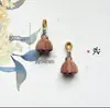 Accesorios colgantes DIY de campana de loto de madera de durazno, amuleto de loto para pulsera, joyería decorativa, cuentas espaciadoras, adorno colgante