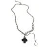 Collar Colgante Flor Negra de Cuatro Pétalos Incrustada de Diamantes para Mujer Diseño de Nicho Cadena para Suéter ins Personalidad Elegante Dulce Fresco Collar