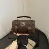Bolso Pequeño de Mano de Alta Gama para Mujer Otoño 2026 Nuevo Bolso Cruzado Retro de Nicho Bolso Cuadrado Pequeño de Hombro a la Moda