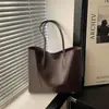 Bolsa de Grande Capacidade para Mulheres 2026 Primavera Novo Estilo Bolsa de Ombro Simples Popular Este Ano para Trabalho e Deslocamento Bolsa Tote de Cor Sólida