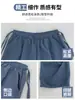 Pantalones de cuadros azules para mujer, nuevo estilo otoño 2026, diseño de cintura alta, aptos para petite, pantalones cargo anchos con cordón estilo americano