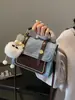 Bolso Texturizado Estilo Commuter Vintage Otoño 2025 Nuevo Nicho Versión Coreana Mochila Bolso Cuadrado Pequeño Bolso Versátil para Mujer