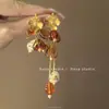 Silhueta de Galho de Flor Super Fada Retrô Francês Brilhante Brincos de Flor Luxo Acessível High-End de Nicho Brincos Elegantes para Férias