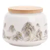 Bote de té de porcelana blanca de tamaño pequeño con un diseño incrustado en oro, que presenta un patrón de jade de grasa de oveja, para almacenar té en casa; portátil y hermético, mantiene el té fresco y previene la humedad
