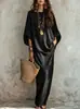 Colección de otoño transfronteriza europea y americana 2026: conjunto de dos piezas para mujer, top casual liso de estilo bohemio y falda larga