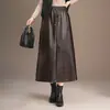 Falda midi para mujer, nueva colección otoño 2026, corte holgado, cintura alta, adelgazante, versátil, longitud media, cintura elástica, piel sintética PU, línea A