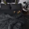 Juego de ropa de cama a cuadros minimalista estilo japonés INS de cuatro piezas, funda de edredón, sábana, juego de tres piezas para dormitorio