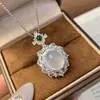 Collar para mujer con colgante bañado en plata con figura de Buda de calcedonia blanco hielo, diseños de hoja y calabaza, ágata y jade de Maitreya