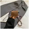 Bolso cruzado de hombro mini de nicho, bolsa para auriculares, bolso pequeño de moda retro, bolso de hombro exquisito de moda otoñal para mujer