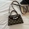 Bolso cuadrado pequeño de lunares para mujer, nuevo bolso cruzado versátil de moda estilo coreano para el verano 2026, bolso de hombro simple para el día a día