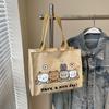 Bolsa Estampada de Desenho Animado Coreano Transfronteiriça para Mulheres 2025 Nova Bolsa de Lona Versátil para Estudantes Bolsa Tote de Ombro de Grande Capacidade