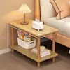 Mesa lateral de doble capa estilo tronco con un diseño simple y estable, adecuada tanto para el dormitorio como para la sala de estar, ofrece almacenamiento conveniente y está disponible a un precio promocional