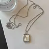 Collar Largo con Borlas Plateadas del Mismo Estilo que una Bloguera Coreana para Mujer, Cadena para Suéter de Tetera de Alta Gama Elegante y Versátil para Mujer