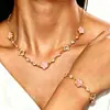 Conjunto de Collar y Pulsera con Colgante de Trébol Esmaltado de Estrella de Cuatro Puntas Incrustado de Diamantes de la Suerte Estilo de Alta Gama Moda Transfronteriza Europea y Americana