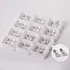 Pendientes de botón creativos europeos y americanos con tachuelas cruzadas simples elegantes casuales combinan con todo galvanizado comercio exterior comercio electrónico pendientes de botón de acero inoxidable venta al por mayor
