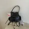 Mochila feminina de grande capacidade para estudantes e通勤者 moda transfronteiriça 2026 novo modelo bolsa de ombro transversal multiuso mochila para estudante universitário