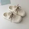 Tênis de treino alemães populares com sola grossa para aumentar a altura para mulheres, novos tênis casuais versáteis de verão 2026, sapatos femininos slip-on com meia-sola