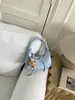 Bolso de mujer vintage de nicho de alta gama transfronterizo 2026 nuevo bolso de hombro cruzado de moda bolso de mano popular tipo albóndiga