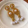 Pendientes de Plata Aguja Perla Gota de Agua Moda Retro Versátiles Pendientes de Botón Lujo Ligero Pendientes de Gama Alta con Sentido de Diseño Nicho