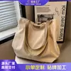 Bolsa de Lona para Mujer, Gran Capacidad, Nuevo Bolso Cubo de Hombro Versátil Otoño e Invierno 2026, Bolso Tote Texturizado para Mujer
