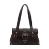 Elegante y moderno bolso de axila para mujer, nueva colección de otoño 2026, con remaches y un diseño retro, perfecto para llevar en la mano