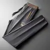 Pantalones de Trabajo de Seda Helada Personalizados para Hombre para Comercio Exterior Transfronterizo, Pantalones Finos de Corte Holgado con Bolsillos y Cremalleras para Trabajadores de Obra