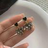 Pendientes de amor con diamantes de imitación negros para mujer, otoño e invierno, bonitos y dulces pendientes de corazón de melocotón con diamantes, venta al por mayor de gran sentido.