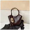 Comercio Exterior Lujo Ligero Retro Bolso Grande Nuevo Moda Mujer Estilo Coreano Nicho Bolso Tote Casual Viaje Diario Bolso de Hombro Único Debajo del Brazo