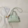 Bolso de axila de lunares dulce y femenino, nuevo y moderno de moda para el verano 2026, bolso de mano personalizado de alto valor, bolso de bolos