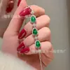 Venta al por mayor de fábrica pequeño rojo departamento material natural peligroso Yang verde calabaza jade pulsera s925 plata incrustada nuevo diseño chino