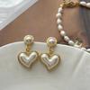 Pendientes retro franceses Xiaoxiang adorables de alta calidad con forma de corazón de melocotón, modernos, dulces, de lujo ligero, para socialité, pendientes elegantes y exquisitos para mujer