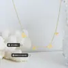 Collar con colgante de letra de personalidad chapado en oro de acero inoxidable con diseño de nicho que combina con todo, regalo para el Día de la Madre.