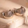 Pendientes de aro geométricos cepillados transfronterizos Europa y Estados Unidos moda metal viento hebilla de oreja lujo ligero temperamento pendientes de alta gama venta al por mayor