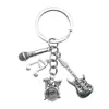 Diseño Creativo Plata Vintage Saxofón Cinta Musical Llavero Transfronterizo Más Vendido Colgante de Bolsa Pequeño Accesorio