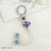 Colgante de cerámica de pez tropical del océano, llavero versátil artístico de nicho hecho a mano con cuentas, adorno de pez pequeño de Jingdezhen