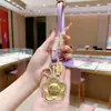 Chaveiro de Ouro Ouro Puro 999 Pingente de Corrente para Celular com Bolsa para Gastar Pingente de Ano Novo Presentes Criativos Culturais Pequenos Venda por Atacado
