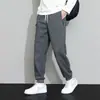 Calça Jogger Casual Solta Masculina Nova Tendência Primavera e Outono Slim Versátil Moda Calça Longa com Punho
