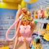 Novo Chaveiro Criativo Rosto de Urso Doodled para Mulheres, Fofo, Fashion, Boneca Exquisita de Resina, Pingente de Mochila Escolar