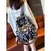 Mochila de Gran Capacidad con Estampado de Marca de Moda 2026 Nueva Moda Casual de Tela Oxford para Mujer Bolso de Viaje
