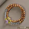 Pulseira de contas de oração budista de madeira crua natural, vendida a quente, sândalo dourado, sândalo Barbie, pulseira colecionável para homens e mulheres, fornecimento para live-stream