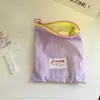 Bolsa de almacenamiento de bloqueo de color macarrón muy elegante, neceser portátil con cremallera, bolsa de transporte para lápices labiales y cosméticos de viaje