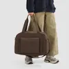 Bolsa de Viagem Curta Leve de Grande Capacidade para Ombro e Mão, Novo Estilo da Moda e Simples para Primavera e Verão de 2026, Esportiva e de Lazer para Mulheres