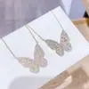 Joyería Transfronteriza Europea y Americana Elegante Cadena para Clavícula de Circonita Cadena de Collar con Colgante Chapado en Oro Real Cadena de Collar de Mariposa Hueca para Mujer