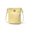 2023 nuevo estilo coreano mini bolso cubo de piel de vaca de primera capa bolso para teléfono de cuero genuino bolso de hombro cruzado simple casual