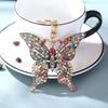 Llavero colgante de metal con forma de mariposa hueca de diamante de color transfronterizo, estilo europeo y americano, creativo, para bolsa de regalo pequeña