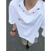 Verano 2026 Nuevo Estilo Pareja a Juego Unisex Diseño Personalizado Cuello Bordado Marca de Moda Camiseta Oversize Holgada